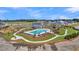 Aerial view of the community pool, playground, and surrounding neighborhood at 123 Grange Cir, Summerville, SC 29486