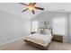 Cozy bedroom showcasing a queen bed with neutral bedding, natural light, and stylish bedside tables at 1236 Lakefront Dr, Charleston, SC 29412