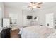 Inviting bedroom with hardwood floors, a ceiling fan, and lots of natural light at 1601 Thin Pine Dr, Johns Island, SC 29455