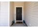Welcoming front door with a decorative wreath and a 'Welcome' sign at 1601 Thin Pine Dr, Johns Island, SC 29455