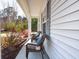 Cozy porch with two wicker chairs with seat cushions at 1601 Thin Pine Dr, Johns Island, SC 29455