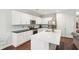 Modern kitchen with white cabinets, stainless steel appliances, and a spacious island at 1601 Thin Pine Dr, Johns Island, SC 29455