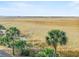 Serene view of expansive marshland from the home's vantage point at 166 W Mariners Cay Dr, Folly Beach, SC 29439