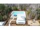 Aerial view of pool, clubhouse, picnic area, and playground in wooded neighborhood at 1847 Grovehurst Drive, Charleston, SC 29414