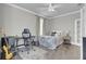 Comfortable bedroom with a ceiling fan, desk, and light gray walls at 1847 Grovehurst Drive, Charleston, SC 29414