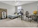 This bright bedroom features carpet, a ceiling fan, a window and unique equipment at 1847 Grovehurst Drive, Charleston, SC 29414