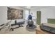 Spacious workout area with a cityscape print, workout equipment, and lots of natural light at 1847 Grovehurst Drive, Charleston, SC 29414