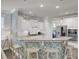 A contemporary kitchen with patterned island, pendant lights, and stainless steel appliances at 1847 Grovehurst Drive, Charleston, SC 29414