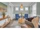 Bright living room featuring hardwood floors, stylish furniture, and decorative accents at 1847 Grovehurst Drive, Charleston, SC 29414
