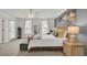 Bright bedroom with a large bed, neutral decor, and plenty of natural light at 1847 Grovehurst Drive, Charleston, SC 29414
