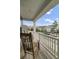 Inviting front porch with rocking chairs, perfect for relaxing and enjoying the neighborhood views at 1847 Grovehurst Drive, Charleston, SC 29414