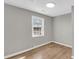 Bedroom with window and wood-look flooring at 1987 Echo Ave, North Charleston, SC 29405