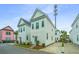 Charming exterior elevation with white siding, well-kept landscaping, and a private driveway at 2001 E Patterson Pt, Hanahan, SC 29410