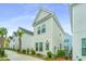 Quaint street featuring modern homes with manicured landscaping and inviting curb appeal at 2001 E Patterson Pt, Hanahan, SC 29410