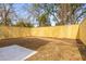 Large backyard with newly-built wood fence providing privacy at 2008 Emden St, North Charleston, SC 29406