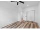 Bedroom features wood-look flooring, ceiling fan, and a closet with bi-fold doors at 2008 Emden St, North Charleston, SC 29406