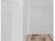 Spacious walk-in closet with white walls, wire shelving, and wood-look flooring at 2008 Emden St, North Charleston, SC 29406