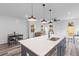 Modern kitchen featuring a large island with pendant lighting and stainless steel appliances at 2008 Emden St, North Charleston, SC 29406