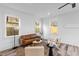 Bright living room with a cozy leather sofa and natural light at 2008 Emden St, North Charleston, SC 29406