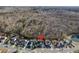 Aerial view of a home in a community with a lake, forest, and nearby neighborhoods at 218 Mayfield Dr, Goose Creek, SC 29445