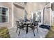 Outdoor patio features a table and chairs for enjoying al fresco dining or entertaining at 218 Mayfield Dr, Goose Creek, SC 29445