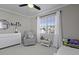 Charming bedroom design featuring a white dresser and a cozy corner at 218 Mayfield Dr, Goose Creek, SC 29445