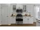 Modern kitchen featuring stainless steel appliances, white cabinets, and a gas range at 218 Mayfield Dr, Goose Creek, SC 29445