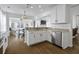 Bright kitchen featuring stainless steel appliances, white cabinetry, and an open layout for modern living and seamless entertaining at 218 Mayfield Dr, Goose Creek, SC 29445