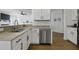 Well-lit kitchen featuring stainless steel appliances and a double basin sink at 218 Mayfield Dr, Goose Creek, SC 29445