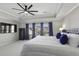 Cozy main bedroom offers backyard view, ceiling fan, and TV for ultimate relaxation at 218 Mayfield Dr, Goose Creek, SC 29445