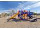 Colorful playground with slides and climbing structures inside of a fenced-in area at 218 Mayfield Dr, Goose Creek, SC 29445