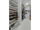 Spacious walk-in closet provides ample storage with shelving for shoes and hanging clothes at 218 Mayfield Dr, Goose Creek, SC 29445