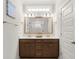 Bathroom showcasing a dual vanity, framed mirror, and stylish lighting at 224 Fiddleback Dr, Summerville, SC 29486