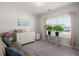 Bright bedroom featuring a white dresser with big window and lots of sunlight at 224 Fiddleback Dr, Summerville, SC 29486