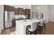 Bright and airy kitchen with stainless steel appliances and a large kitchen island at 224 Fiddleback Dr, Summerville, SC 29486