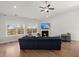 Bright living room featuring a fireplace and large windows at 224 Fiddleback Dr, Summerville, SC 29486