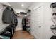 Well-organized walk-in closet with rods and shelving, maximizing space for clothing at 224 Fiddleback Dr, Summerville, SC 29486