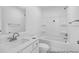 Bright white bathroom with a sink and a combined bathtub/shower at 224 Night Heron St # 629, Summerville, SC 29486