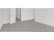 An empty room with grey carpet and white walls and trim at 224 Night Heron St # 629, Summerville, SC 29486