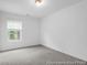 Bedroom featuring neutral carpet, a window with blinds, and ample natural light at 224 Night Heron St # 629, Summerville, SC 29486