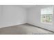 Spacious bedroom with neutral carpet, a large window, and ample natural light at 224 Night Heron St # 629, Summerville, SC 29486