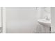 A simple half bathroom with a pedestal sink and brushed chrome faucet at 224 Night Heron St # 629, Summerville, SC 29486