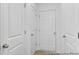 Bright hallway with multiple white doors and neutral flooring at 224 Night Heron St # 629, Summerville, SC 29486