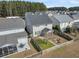 Expansive view of backyard with firepit and exterior showing a well-kept lawn at 231 Laurel Crest Way, Summerville, SC 29486