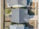 Birds eye view of the roof and backyard showing a fire pit at 231 Laurel Crest Way, Summerville, SC 29486