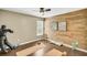 Calming bedroom with a wood accent wall, yoga mats, and natural decor for a serene and minimalist space at 231 Laurel Crest Way, Summerville, SC 29486