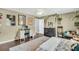 Spacious bedroom with decor and furnishings, including dark wood flooring, rug, and a ceiling fan at 231 Laurel Crest Way, Summerville, SC 29486