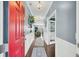 Bright entryway with hardwood floors, blue walls, and white trim, with view to the living room at 231 Laurel Crest Way, Summerville, SC 29486