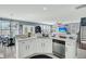 Bright kitchen with stainless steel appliances, white cabinetry, and a modern backsplash at 231 Laurel Crest Way, Summerville, SC 29486