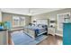 Main bedroom with hardwood floors, neutral walls, a ceiling fan, and large windows at 231 Laurel Crest Way, Summerville, SC 29486